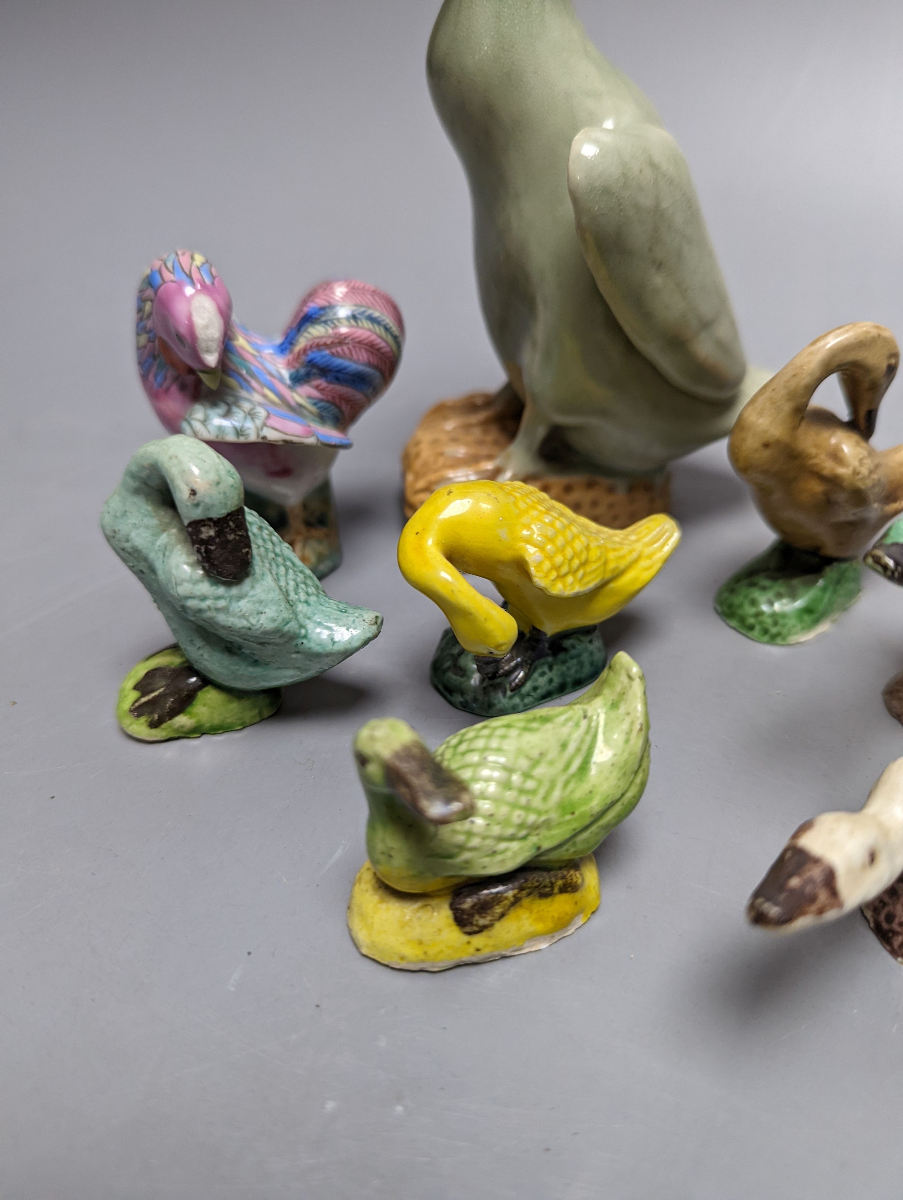 Seven Chinese ceramic ducks and a cockerel 15cm